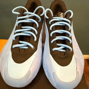 Adidas Anthony Edwards A E 1 Low basketball shoes, blue/black.